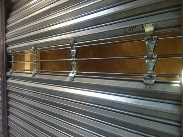 Cortina tubular con eslabón