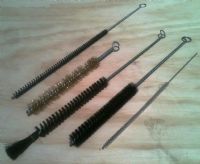 Escobillones en diversos materiales.