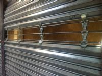 Cortina tubular con eslabón